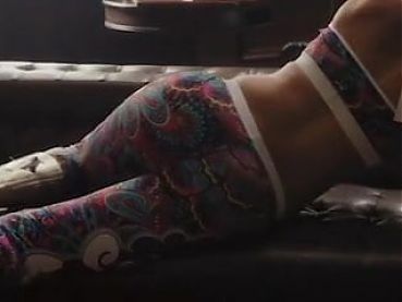 WWE - Bayley laying on a couch, zoom in on her amazing ass