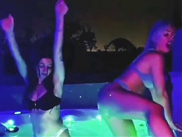 Mandy Rose and a hot brunette dancing in hot tub